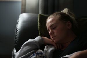 Tired woman before Hormone Replacement Therapy treatment